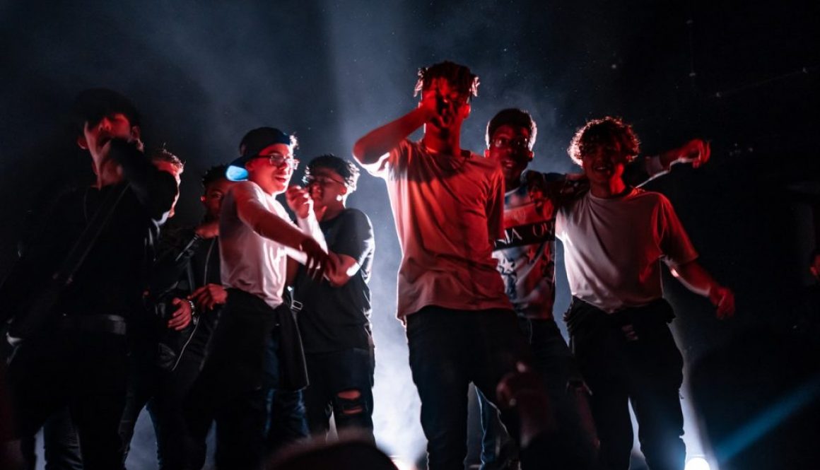 group singing on stage